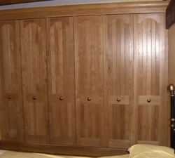 Panelled, solid Oak fronted, built in wardrobes