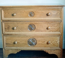 A solid Oak, three drawer unit with a geometrical carved design. Each carving increases in size as the drawers increase in size, the largest drawer being at the base of the unit. Handles in solid Oak, complete the country feel of this unit.   Built for a client in West Park, Leeds.