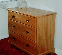 Solid Elm drawer Unit. A drawer unit built in solid Elm. This piece incorporates two full length and two half length drawers. Traditional handles were used to finish the unit. Built for a client in Wrose, Shipley
