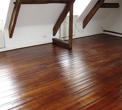 Antiqued Dark Oak Flooring. This solid Oak flooring was selected for its dark, antique finish to compliment the original Oak beams in this period property