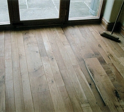 Random Width Oak Flooring. Random width Oak boards were used to create a rustic look. The boards were oiled, which gives a matt finish, keeping with the rustic theme.