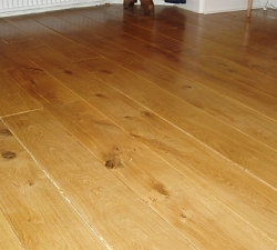 Rustic Oak Flooring. Solid Oak flooring, chosen for its rustic grain and wide boards. Secretly nailed to complete the perfect finish