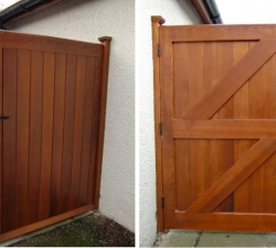 Cedar Ledge and Brace Wooden Garden Gate. A tongue and groove panelled garden gate made in sustainable Western Red Cedar, FSC Certified. The gate is constructed using double haunched mortise and tenon joints. The gate posts have been topped with moulded Ovalo finials. Antique Black Cast Iron door furniture provide the finishing touches. A 5 lever insurance quality lock has been fitted