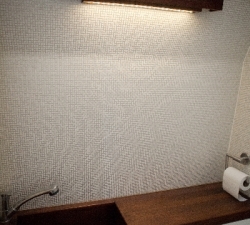 Bespoke wooden sink and wooden light fitting for a motorhome