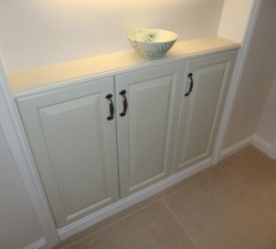 Bespoke, fitted hallway storage cupboard.
