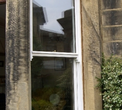One of a pair of mock Sash hardwood, entrance hall windows.