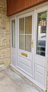 Field & Raised Panelled Door with Clear Side Lights