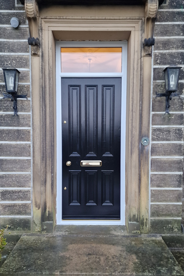 Bespoke Accoya Victorian front door with six-panel design, fanlight and brass door furniture for a period property.